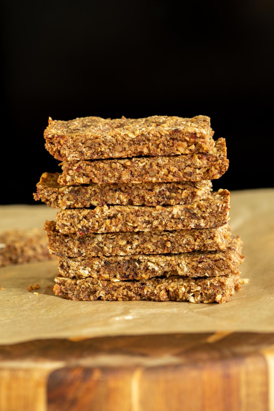 side view of a stack of vegan caramelized banana granola bars