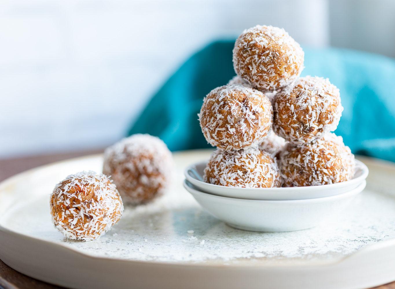Easy Vegan Carrot Cake Bites Recipe! These Spiced Nut and Carrot Cake Balls Need just 8 ingredients and 15 minutes. Grainfree Carrot Cake Bliss Balls. Roll in coconut or dress with vegan cream cheese glaze. #CarrotCakeBites #Vegan #Glutenfree #Grainfree #Soyfree #healthy #VeganRicha VeganRicha.com