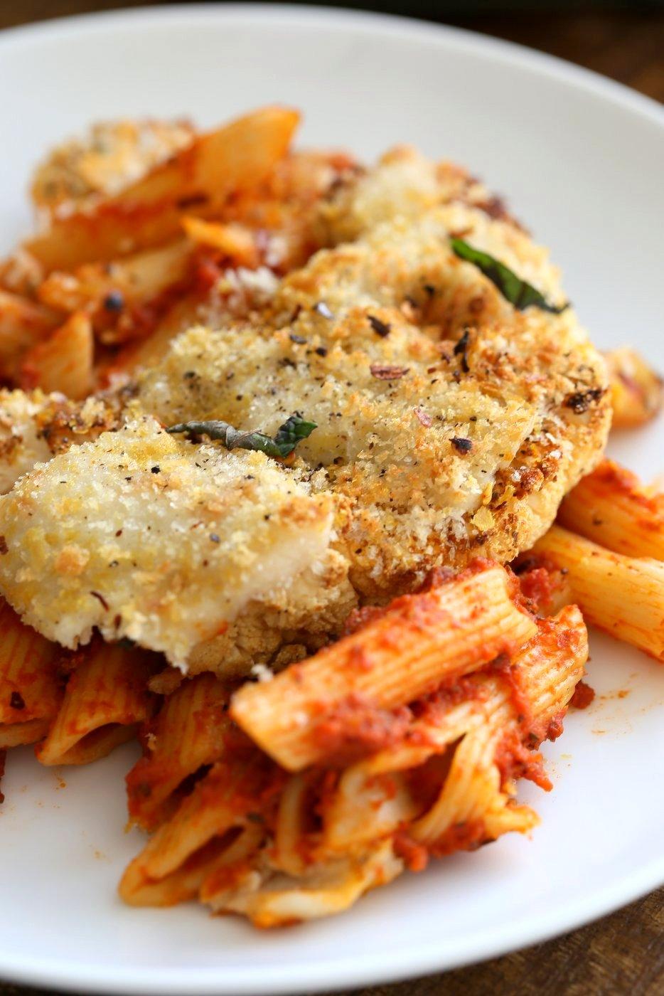 Vegan Cauliflower Parmesan Pasta Bake. Pasta, marinara sauce, Crispy Cauliflower slices coated in breadcrumbs and spices, and vegan mozzarella. Soy-free Recipe. Can be gluten-free | VeganRicha.com