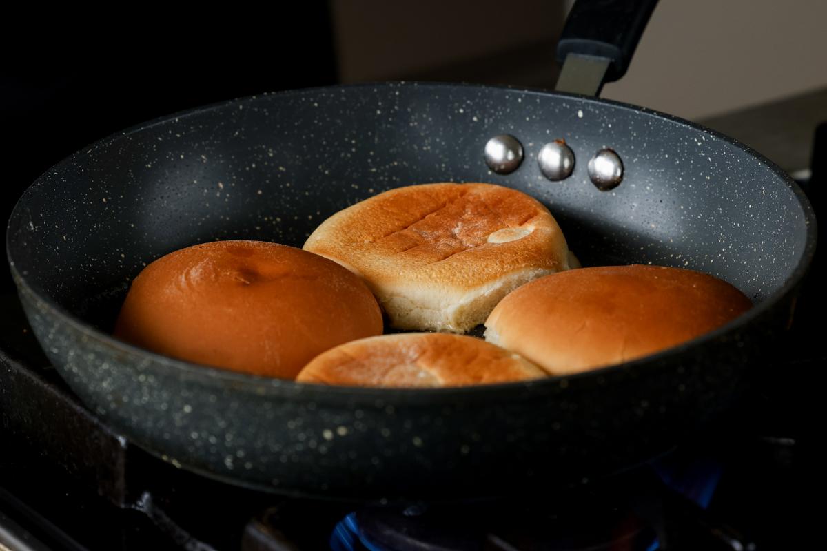 toasting the buns in the pan