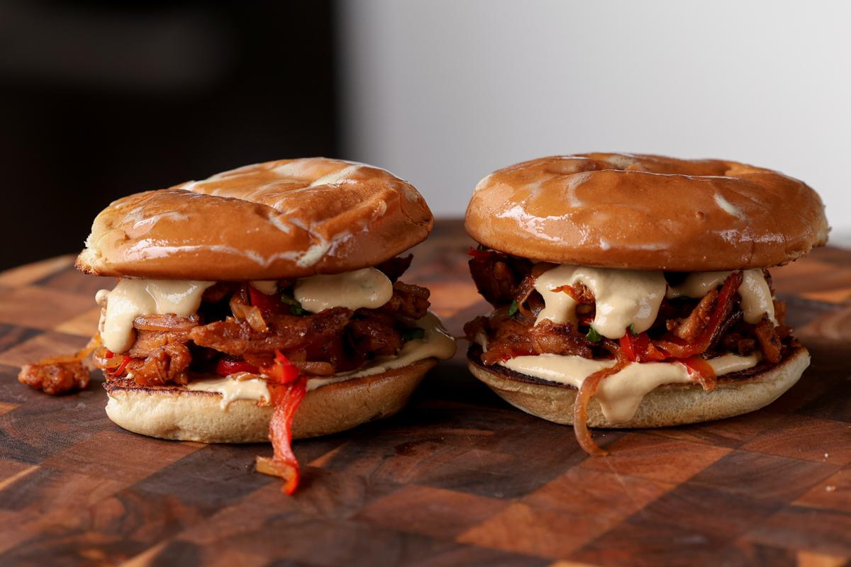 vegan cheesesteaks on a cutting board