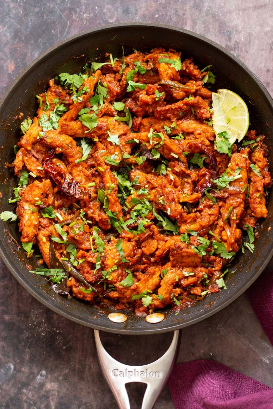 overhead shot of a frying pan with vegan chicken kondattam