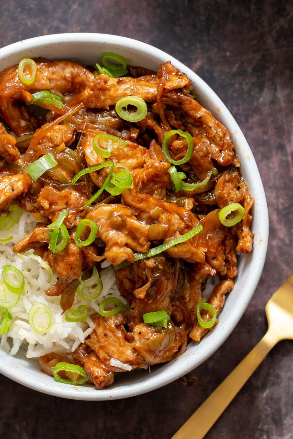 overhead shot of vegan chili chicken sprinkled with chopped green onions