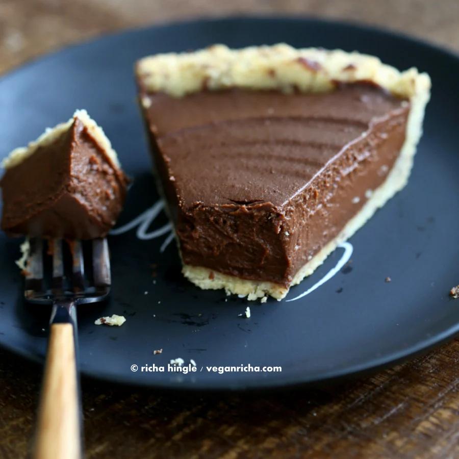 a slice of Vegan Chocolate Pumpkin Pie with one forkful missing