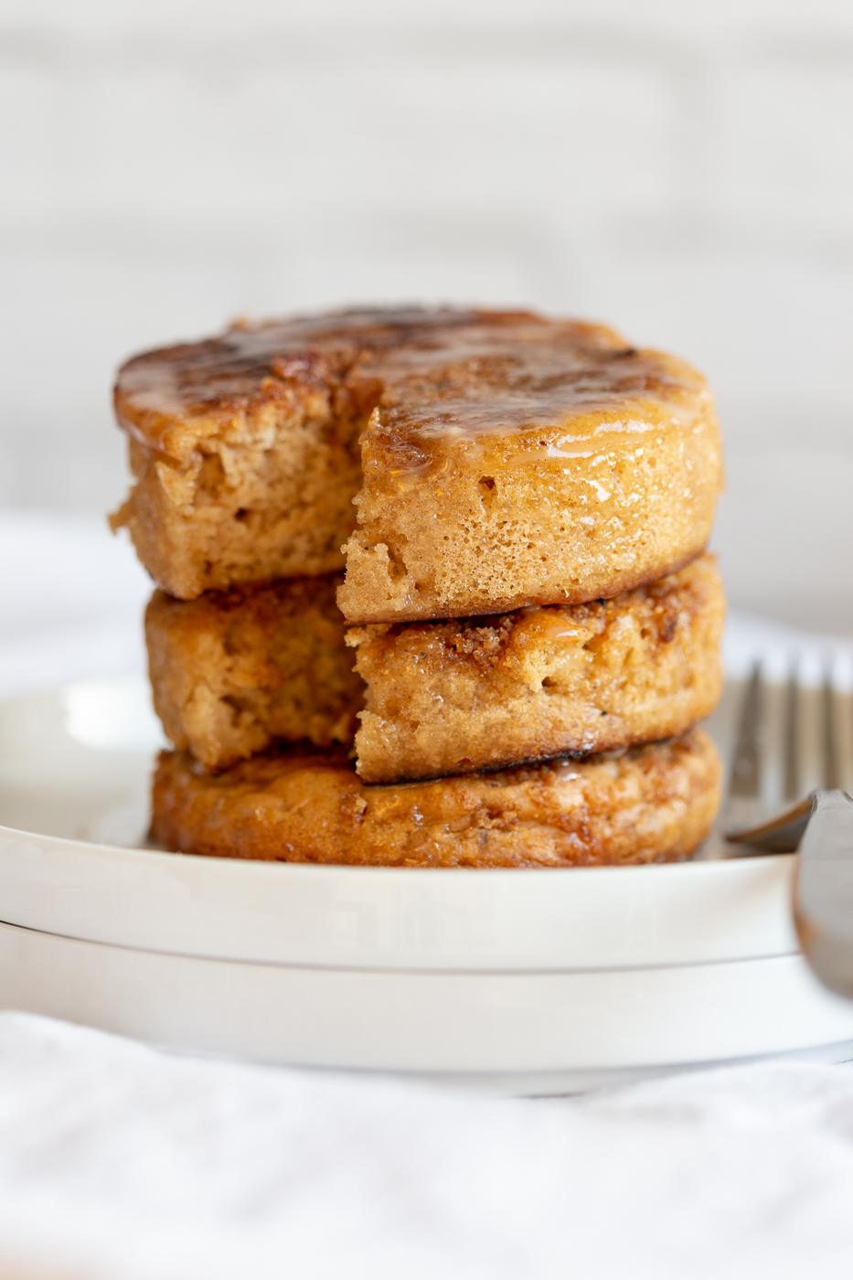 Vegan Cinnamon Streusel Pancakes tower on a white plate