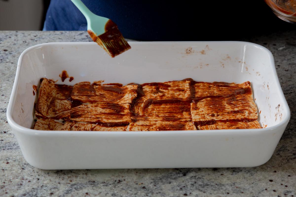tofu deli slices in the pan before baking