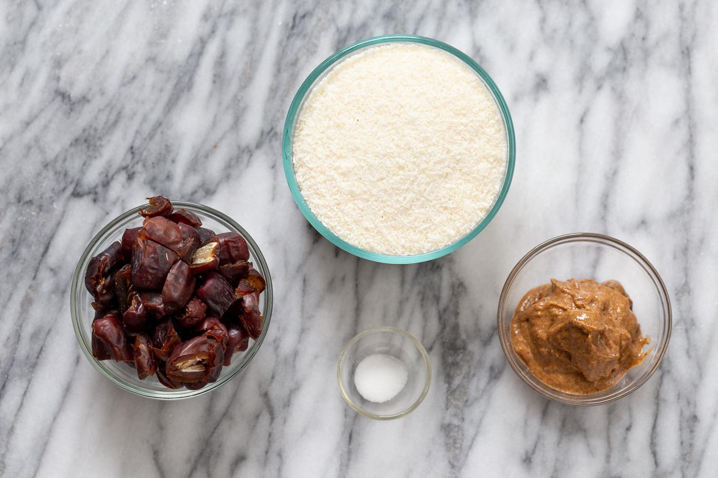 overhead shot of ingredients needed for making vegan date coconut balls