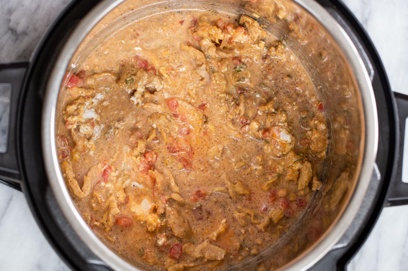 vegan coconut chicken curry ingredients mixed in instant pot ready for cooking