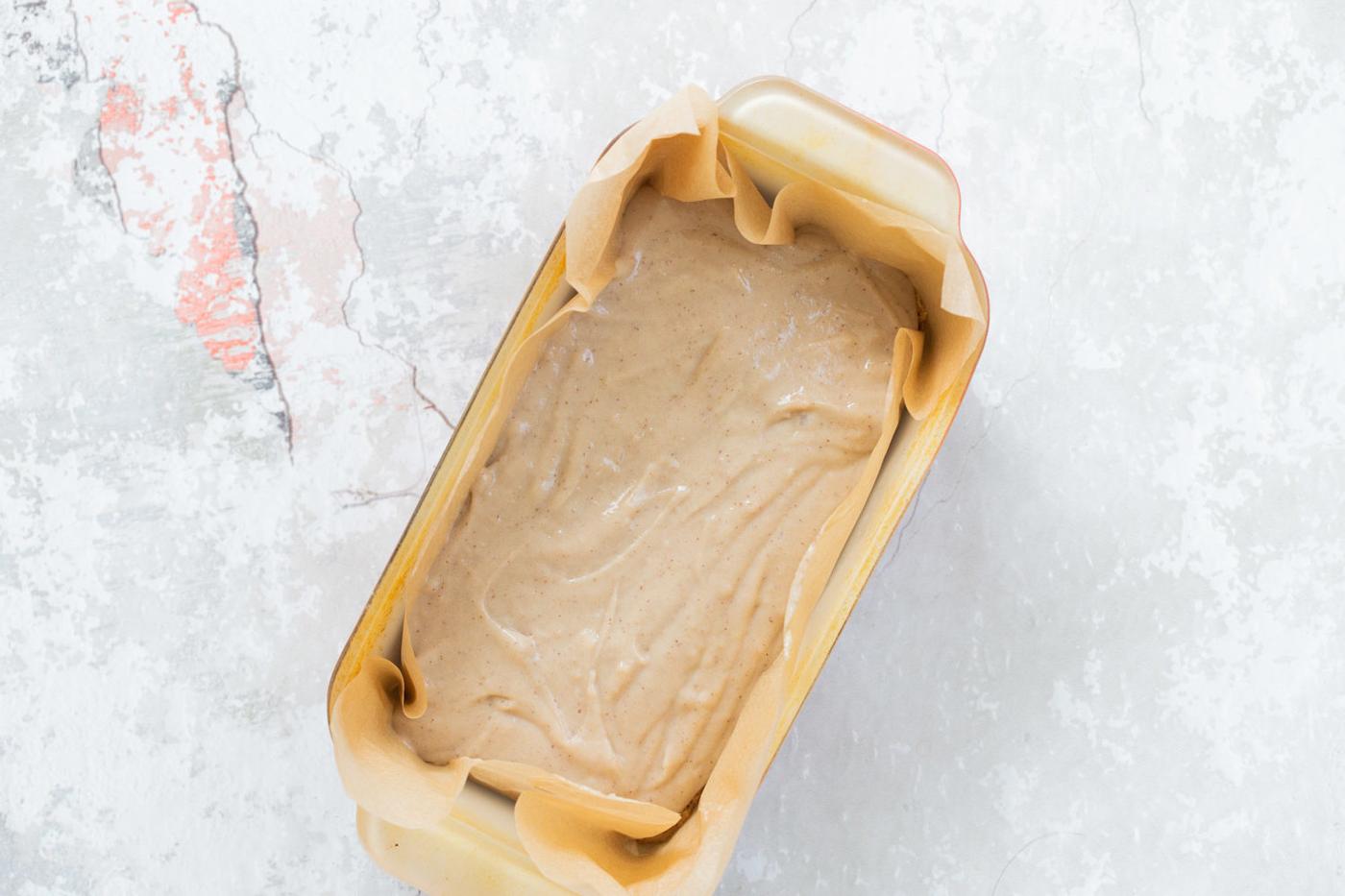 Ice cream layer in a baking pan for our Vegan Cookie Dough Ice Cream Sandwiches