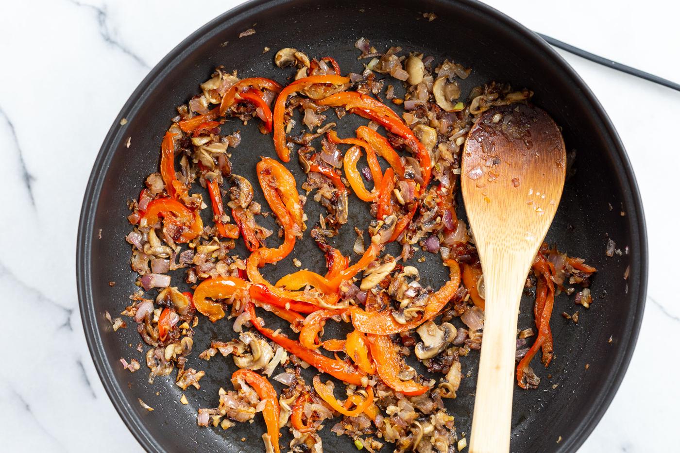 Onion and pepper for our creamy cajun pasta sauce
