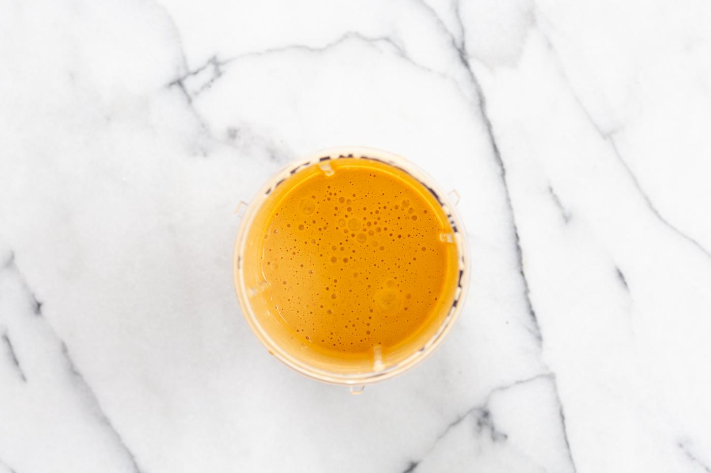 Our Vegan Cream Cajun Pasta Sauce in a bleender