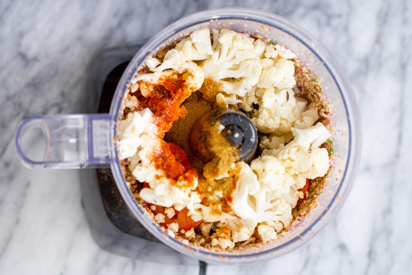 cauliflower and more taco meat ingredients in a small food processor