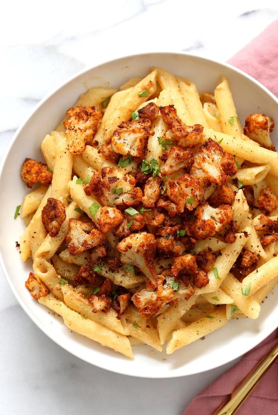 Creamy Garlic Sauce Penne pasta with Roasted Cauliflower in a Bowl