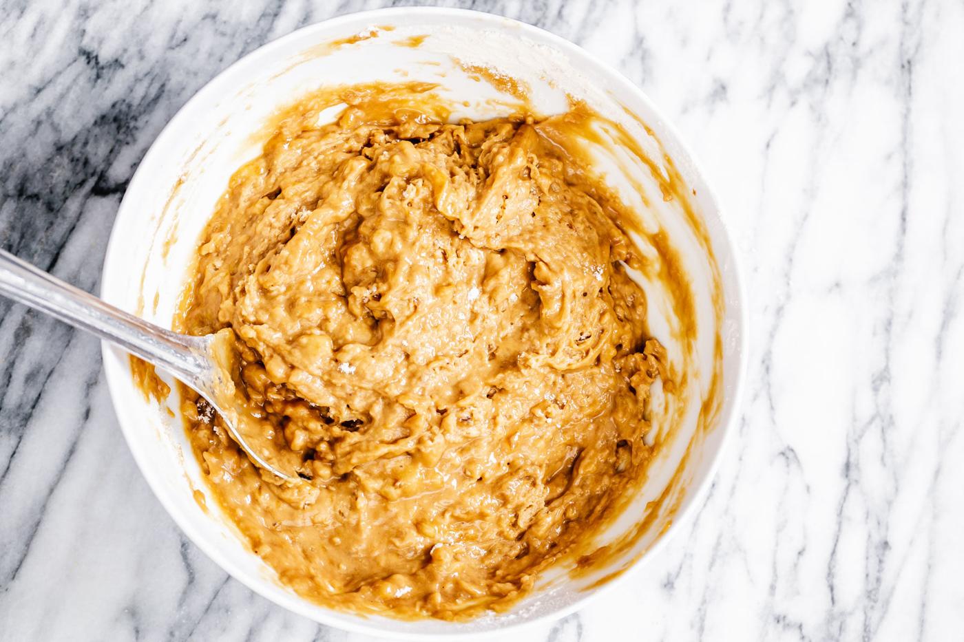 vegan gingerbread banana bread batter in a white bowl