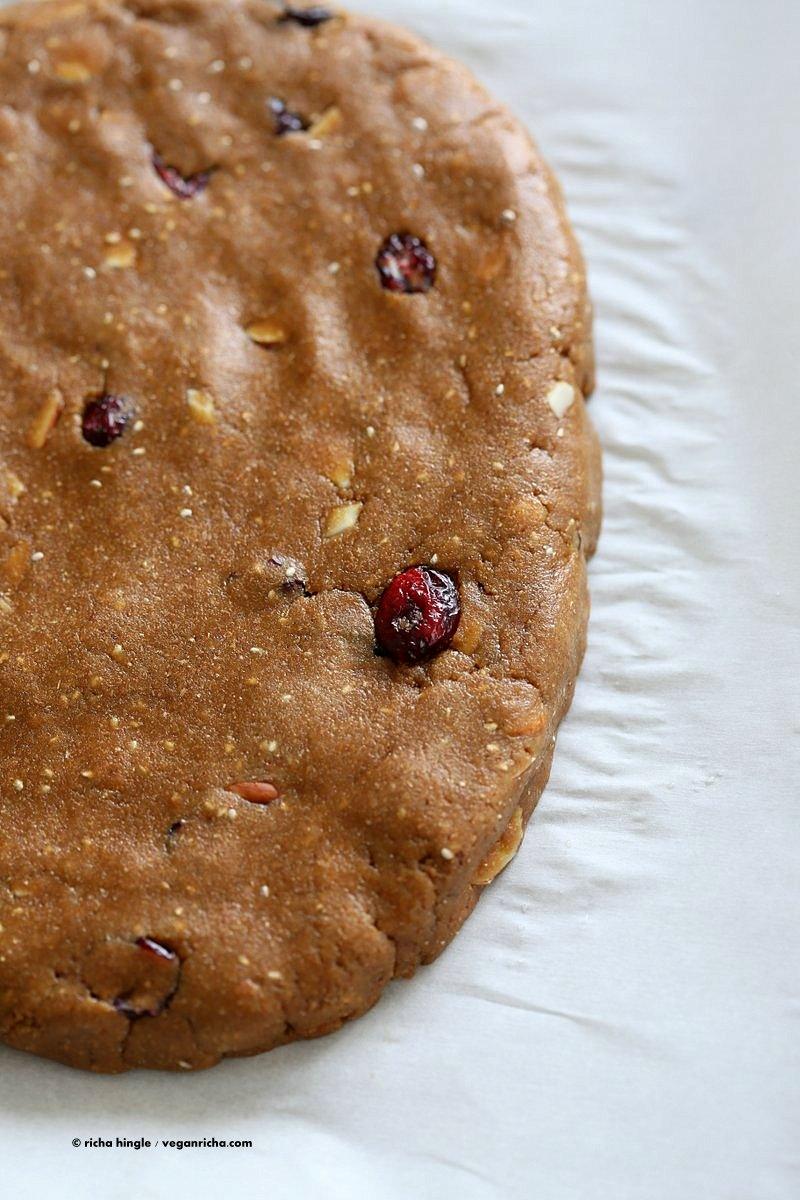 Vegan Gingerbread Biscotti with cranberries, almonds, candied ginger. Easy Crispy Spiced Biscotti Recipe to dunk in a cup of tea. Drizzle with white or dark chocolate. | VeganRicha.com #vegan #gingerbread #biscotti #recipe