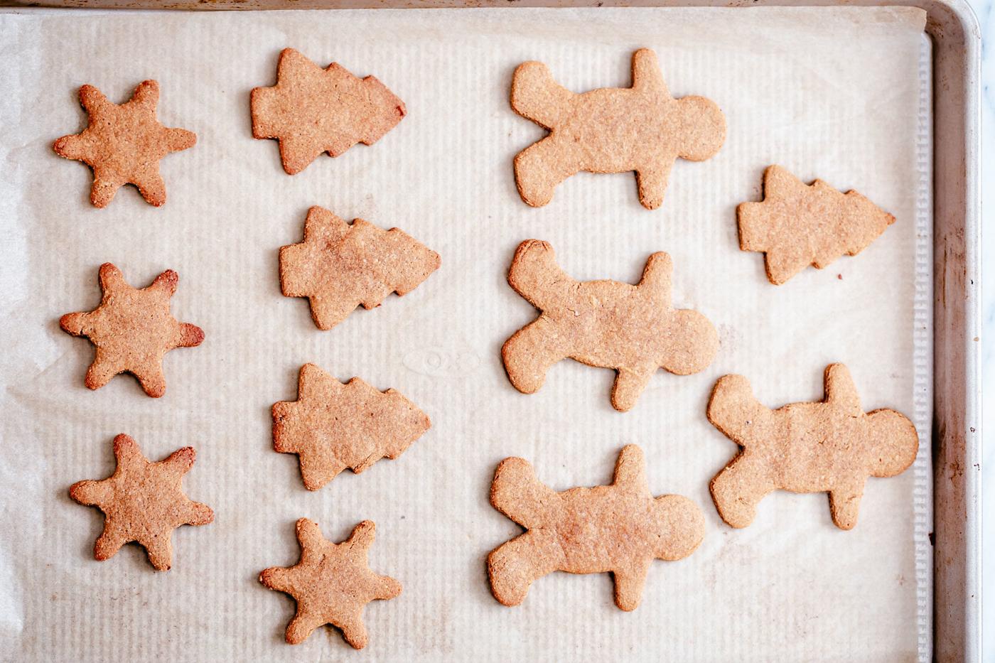 baked vegan gingerbread cookies on a cookie sheet