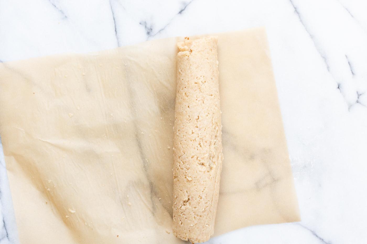 Rolled Dough of our Vegan Glutenfree Cinnamon Rolls on parchment