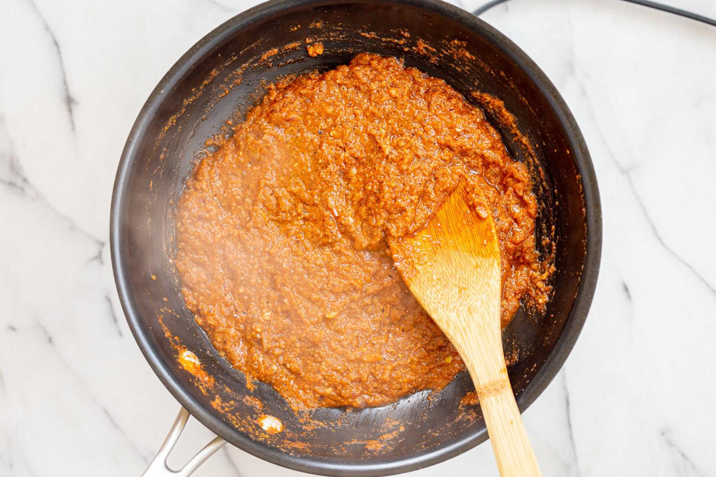Sauce for our Vegan Keema Madras on a black skillet