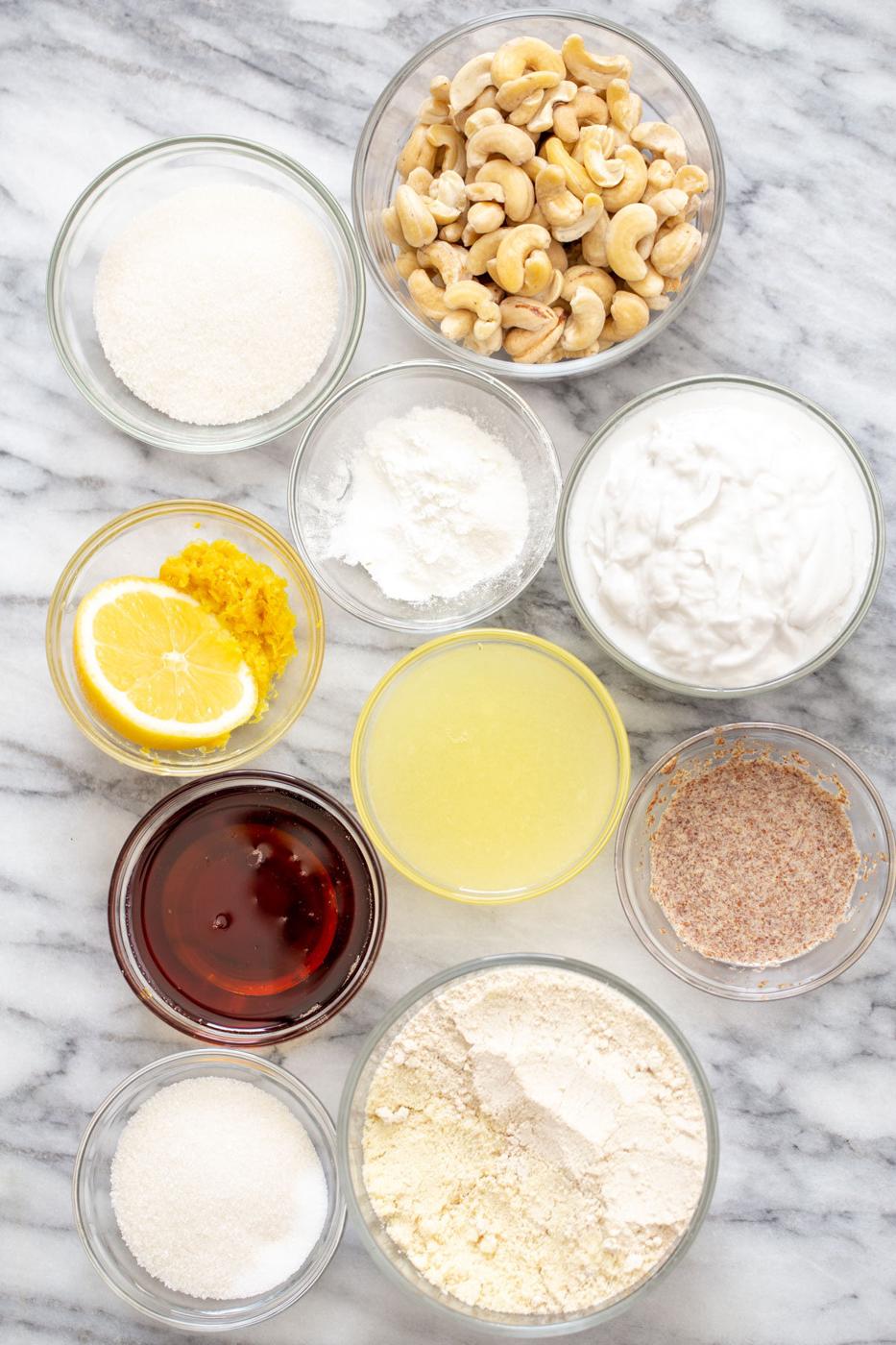 ingredients for vegan lemon bars on a marble counter