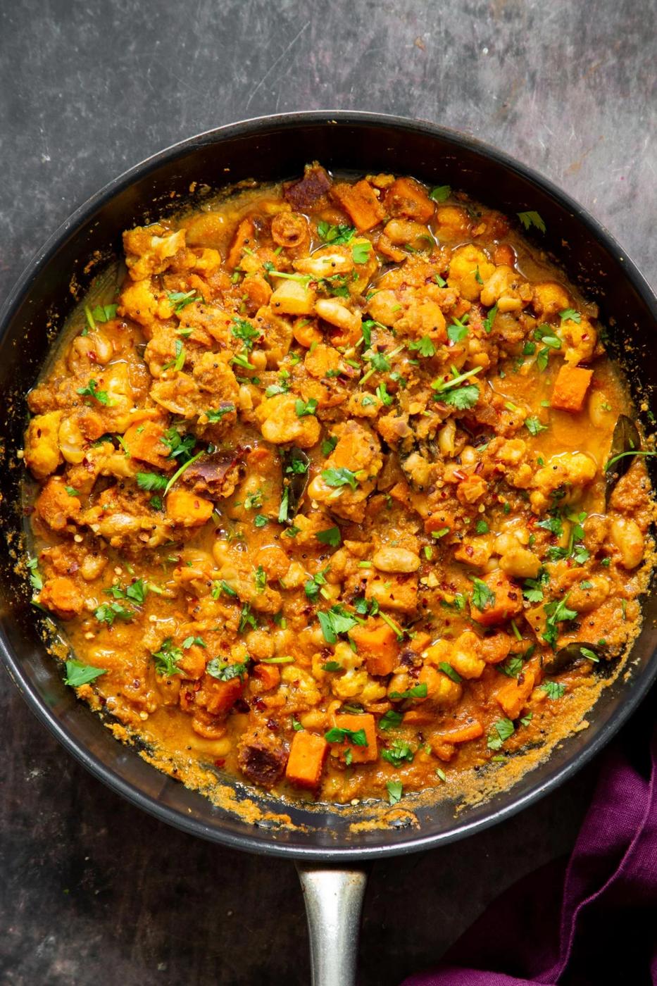 vegan malabar curry in a black skillet