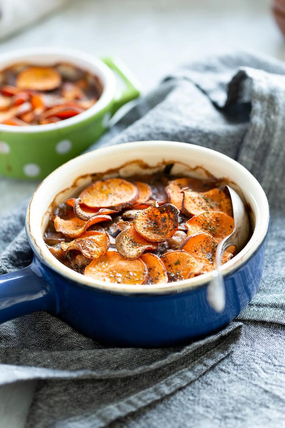 Our Vegan Mushroom Pot Pie in green and blue baking dishes