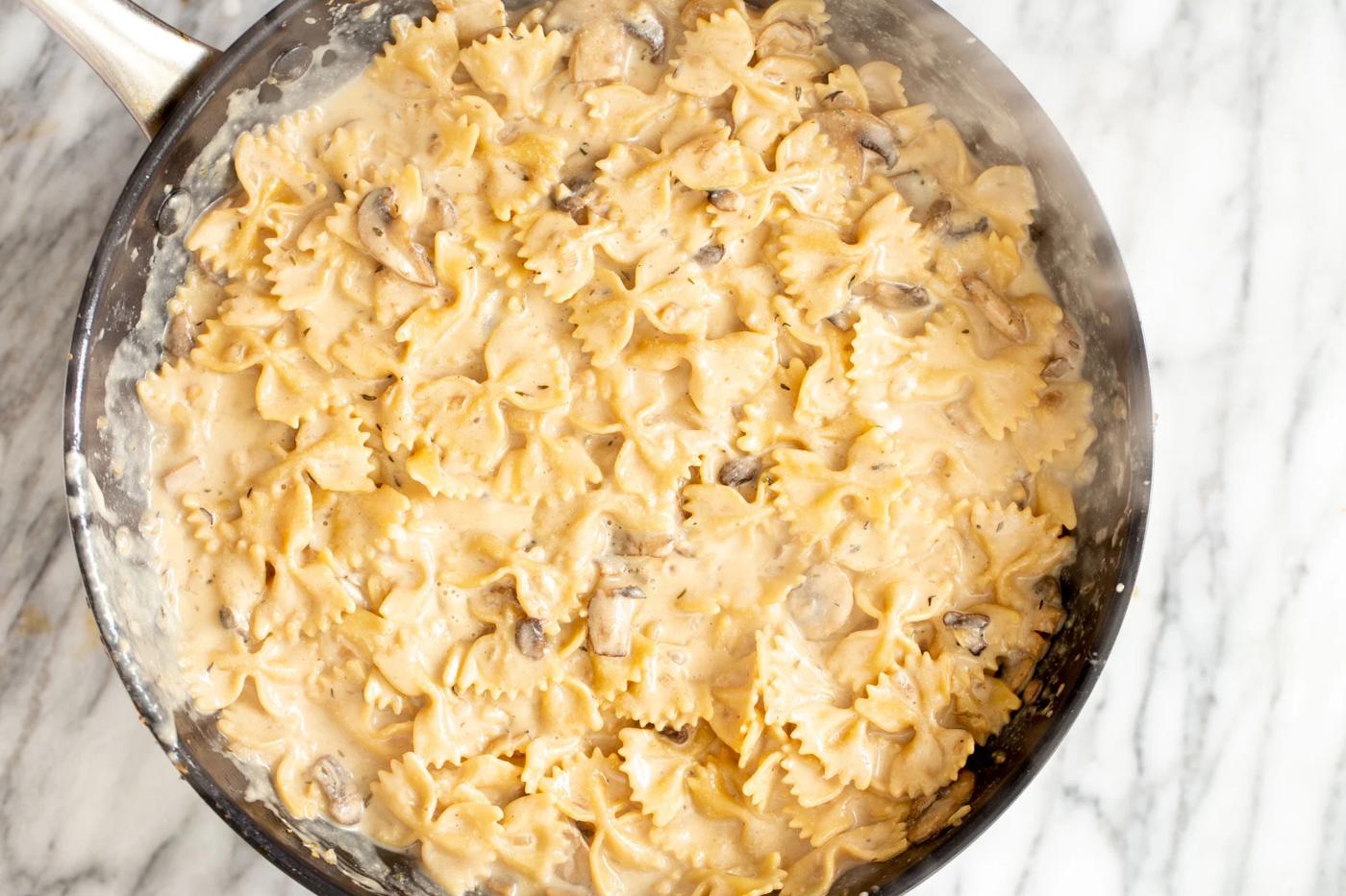creamy vegan mushroom stroganoff in a saucepan