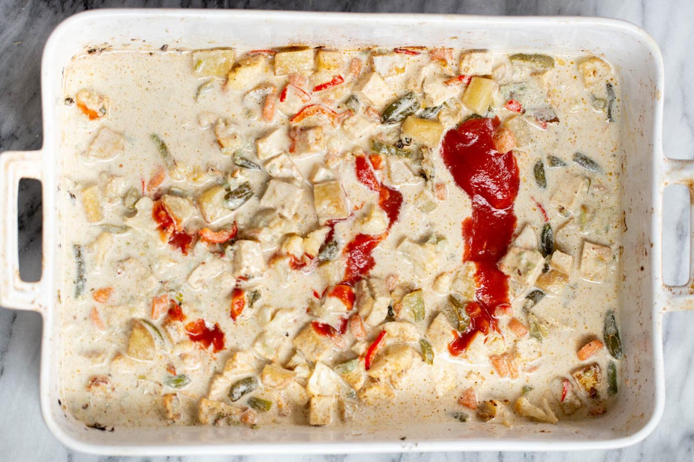 baked Navratan Korma curry in a casserole dish