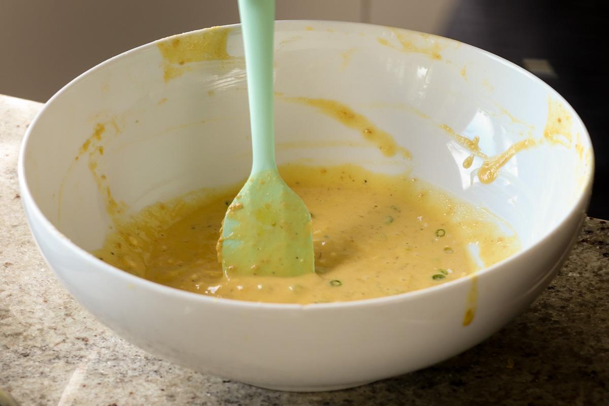 chickpea omelet batter in the bowl, after mixing