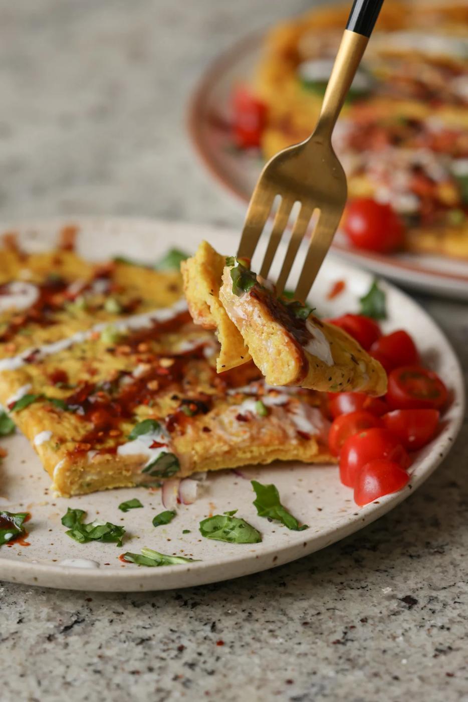 fork taking a bite of a vegan omelet