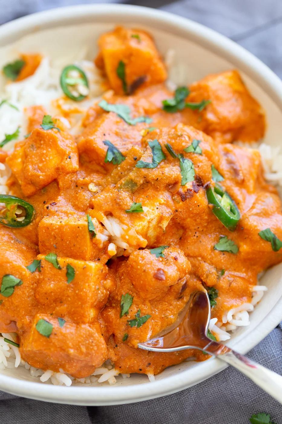 Vegan Paneer Lababdar with rice in a white bowl