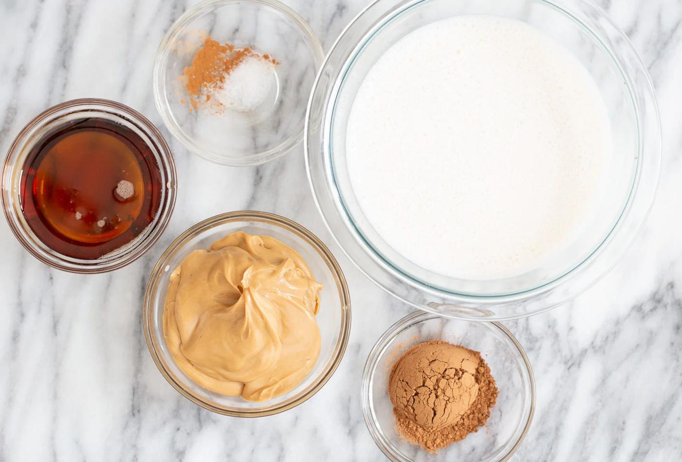 Ingredients for vegan peanut butter mousse in bowls