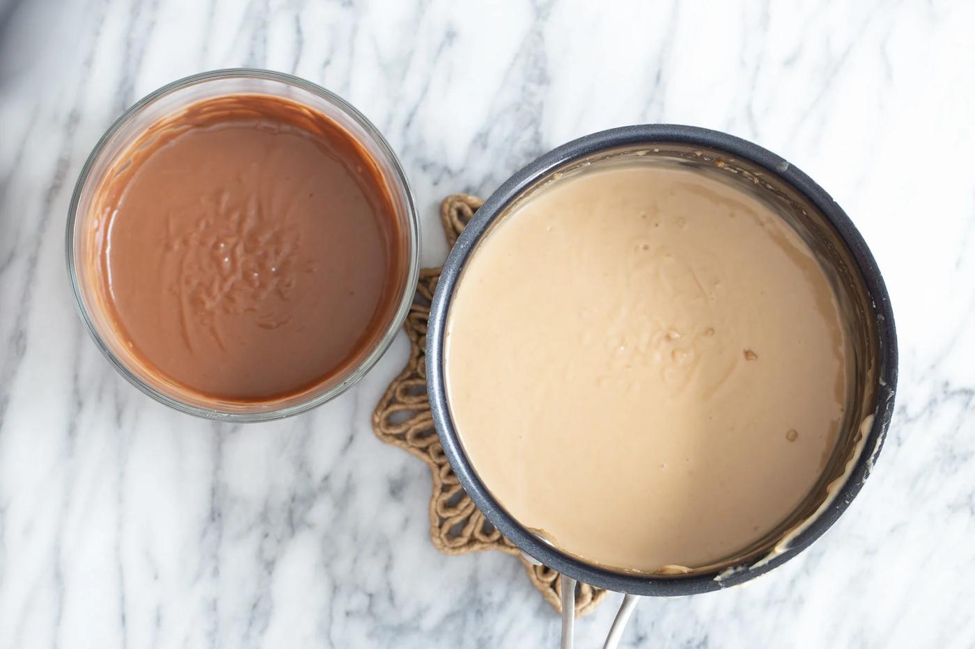 peanut butter mousse and peanut butter chocolate mousse in two separate bowls
