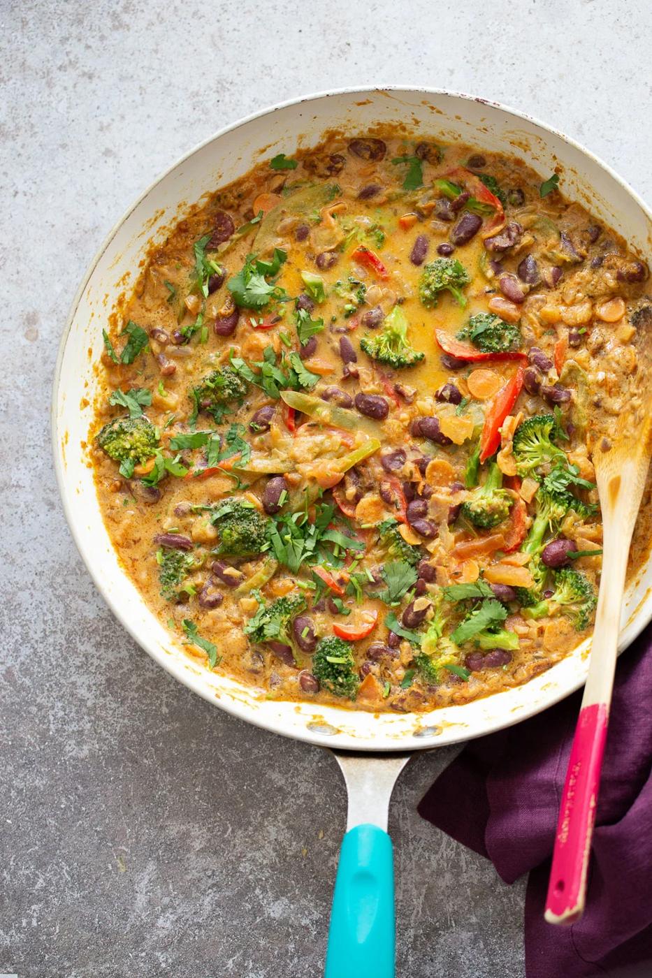 overhead shot of a saucepan with creamy Vegan Peanut Stew with kidney beans