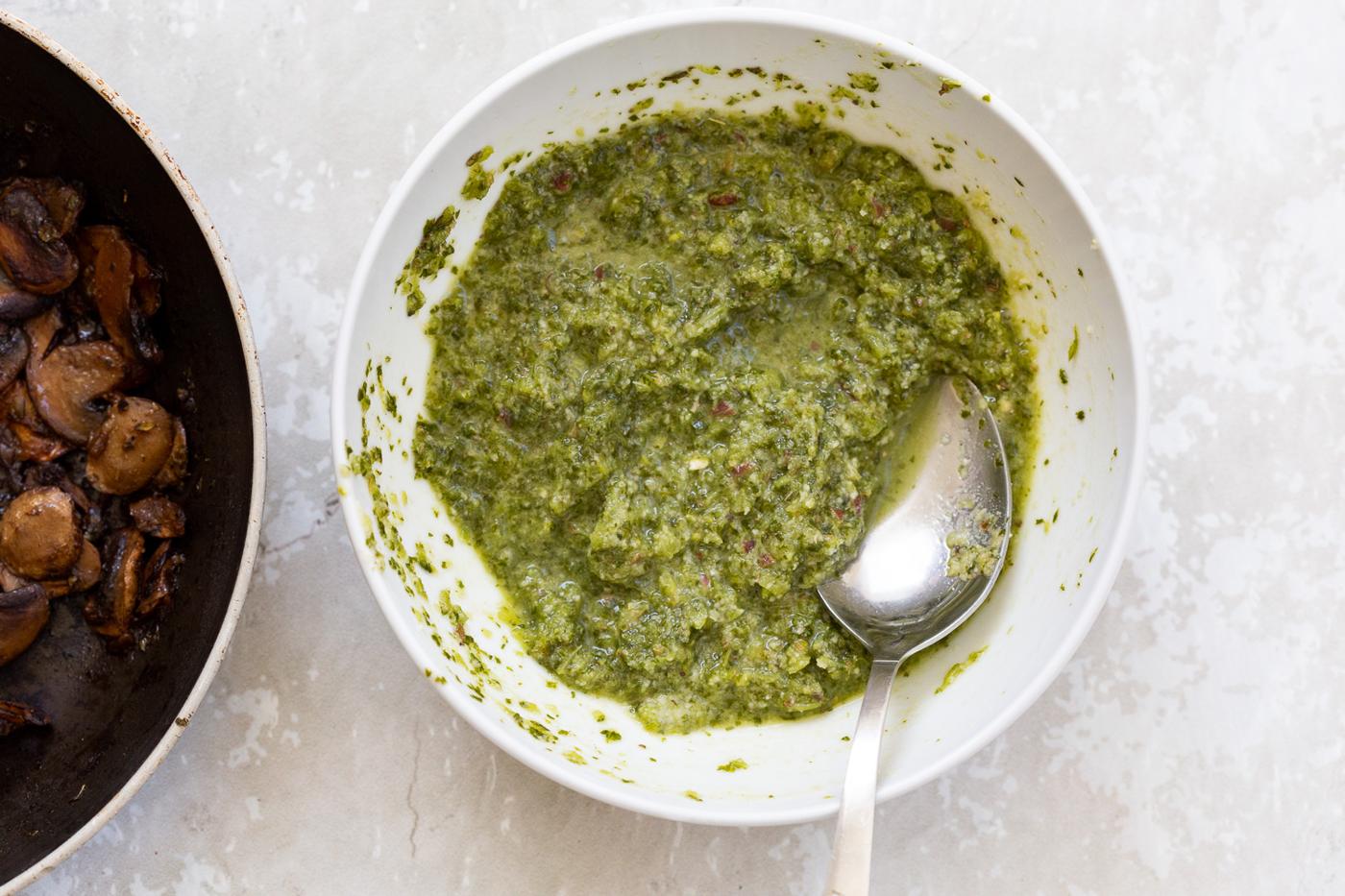 vegan pesto in a small white bowl