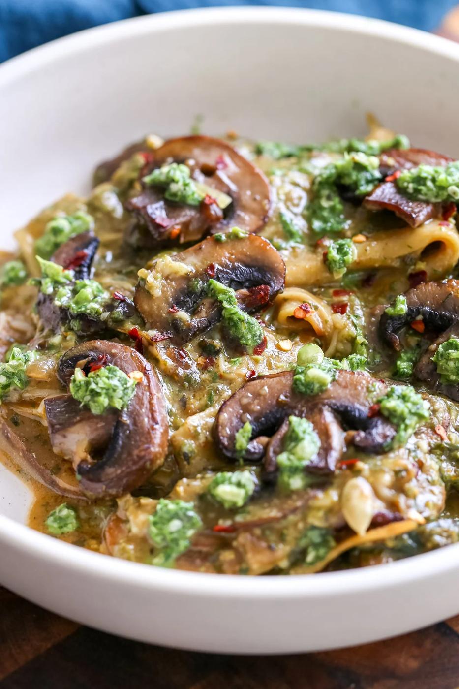 a bowl with pesto skillet lasagna with mushrooms and basil pesto