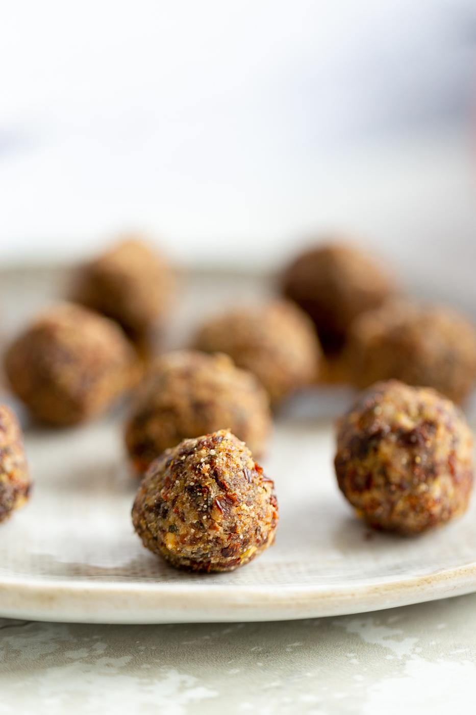 gluten-free vegan pizza snack bites on a white plate