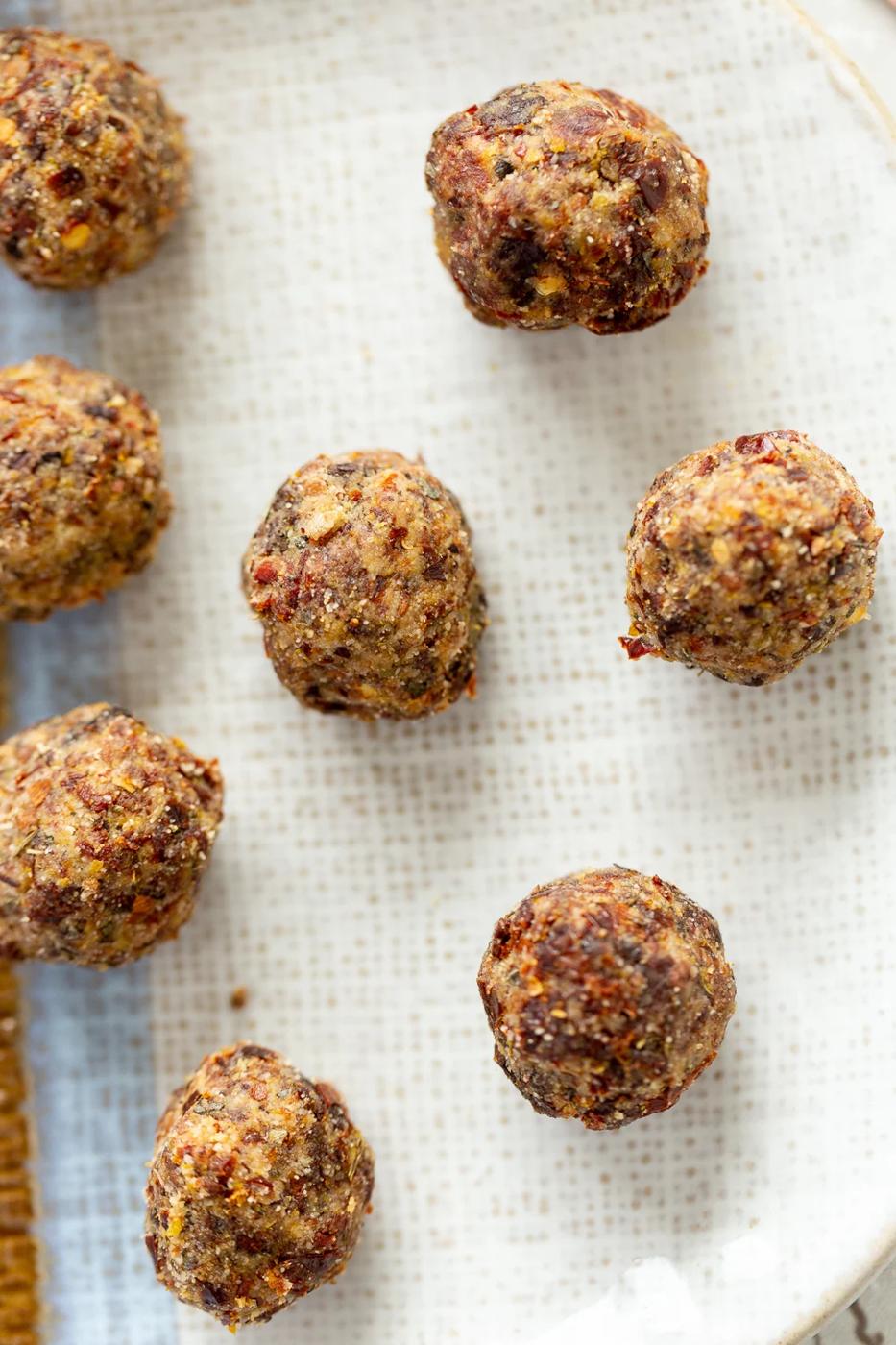 overhead shot of pizza bites on a baking sheet