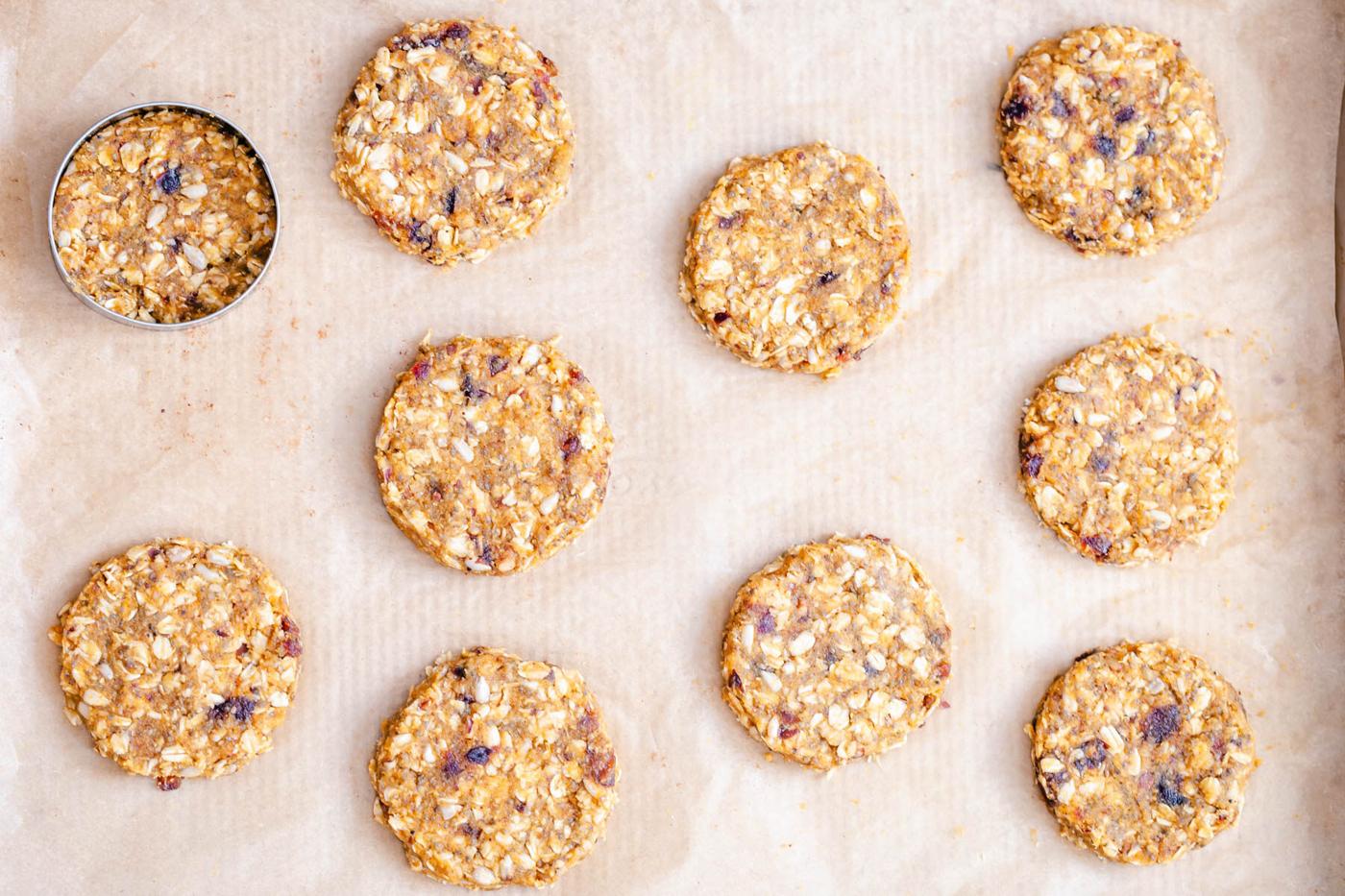 unbaked pumpkin breakfast cookies on a cookie sheet