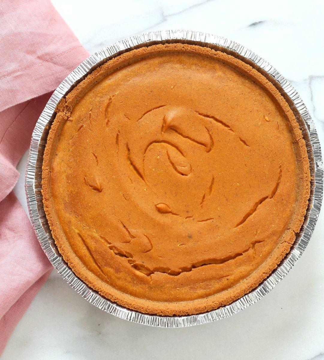 Vegan Pumpkin Cheesecake with graham cracker style crust. Easy Creamy Pumpkin Cheesecake to please everyone. Gluten-free with gluten free crust.# Soyfree #Recipe #vegan #pumpkinheesecake #veganricha | VeganRicha.com
