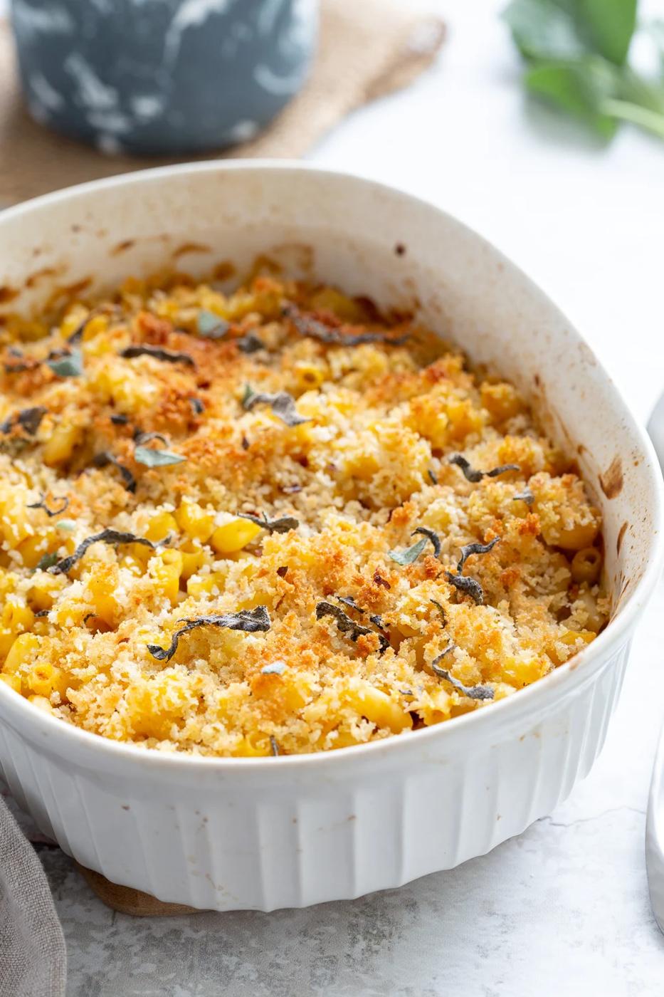 Vegan Pumpkin Mac and Cheese Bake. Easy Creamy Pumpkin Sauce with pasta, topped with crisp sage and breadcrumbs. #Vegan #Soyfree #Recipe #VeganRicha #nutfree option