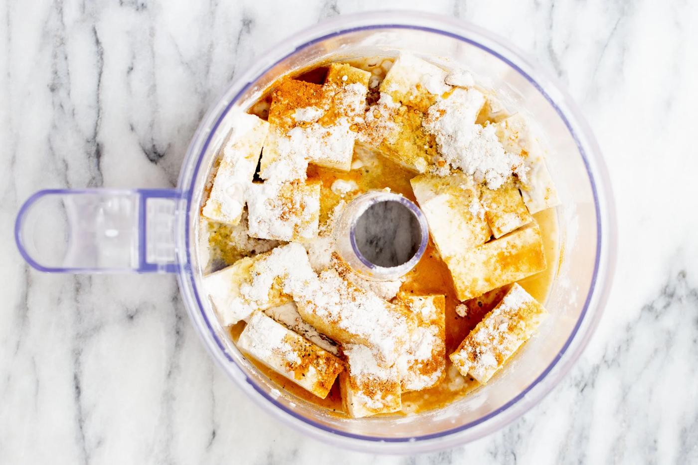 cubed tofu in a food processor