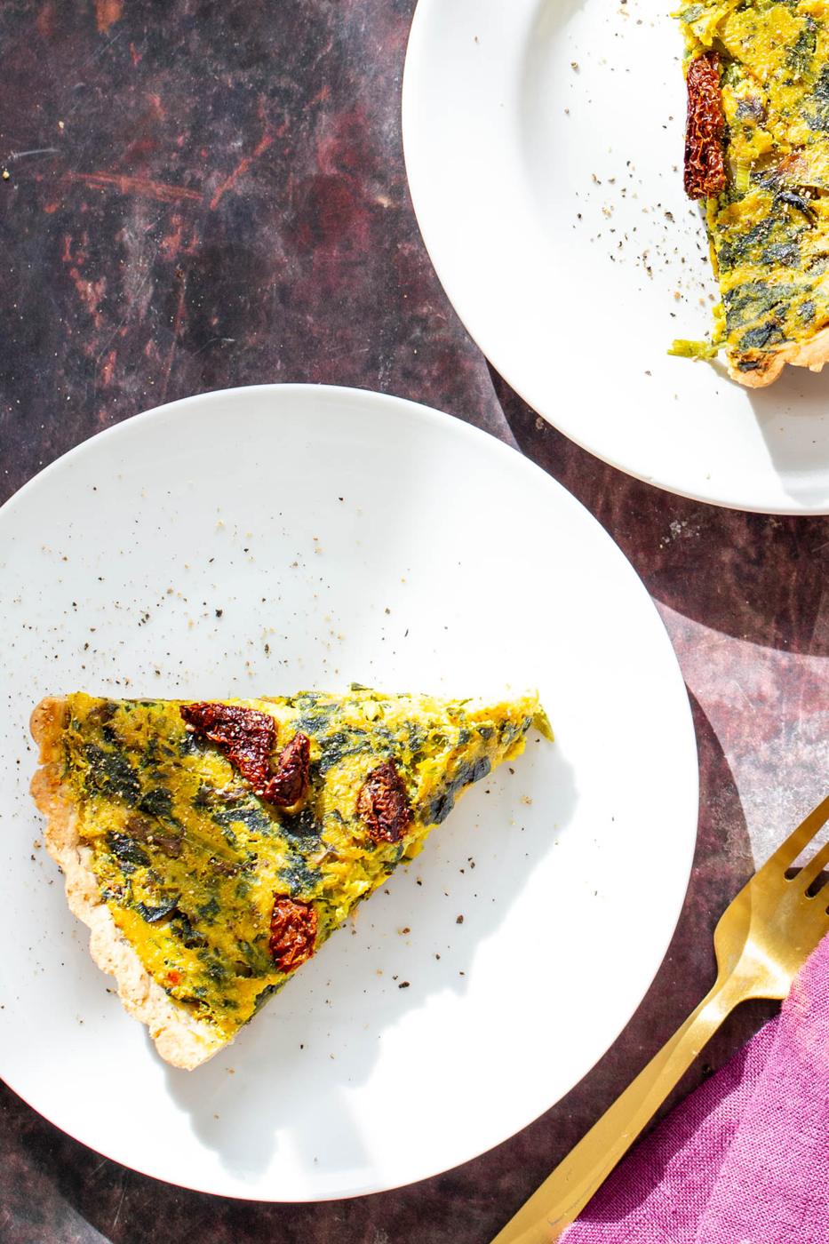 overhead shot of a slice of vegan quiche