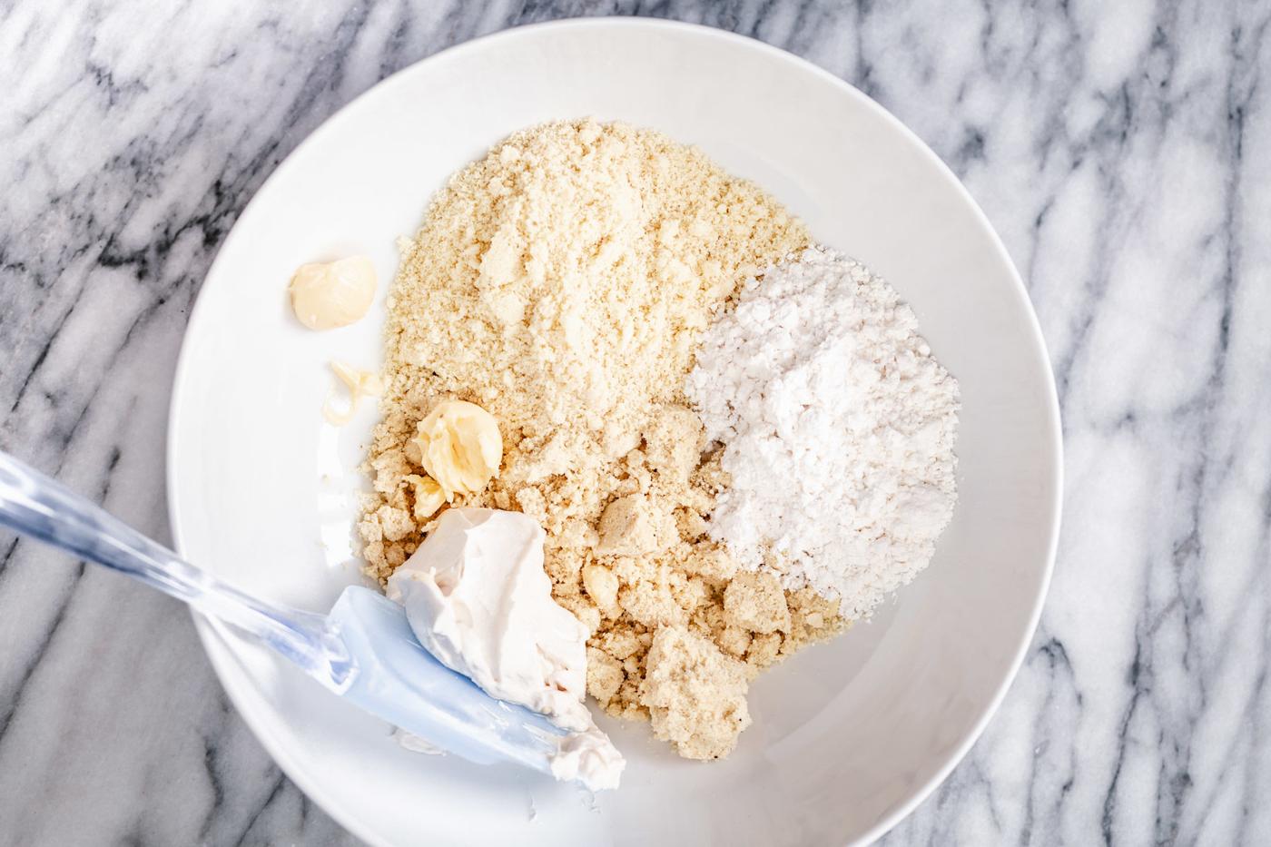 dry mix for vegan rasmalai cake in a small bowl