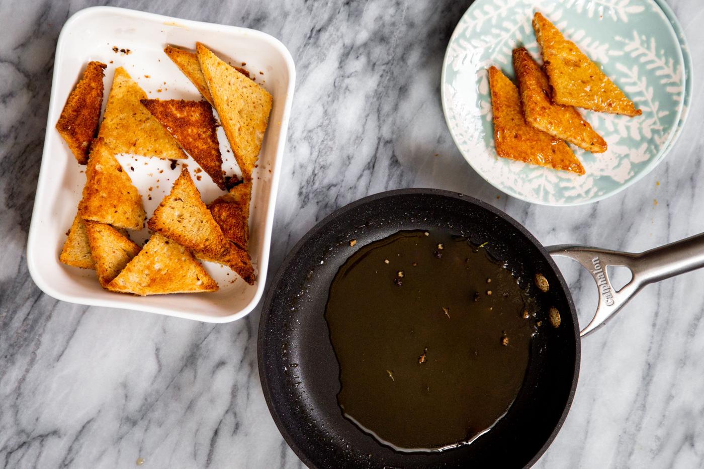 sliced of toasted bread next to a saucepan with sugar syrup