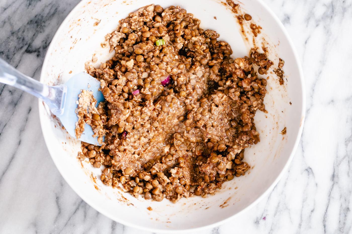 lentil meatloaf mixture in a white bowl