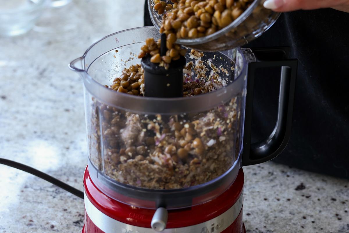 adding lentils to the food processor