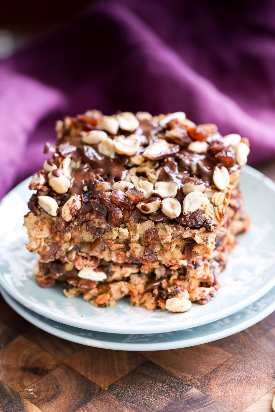 stacked squared of vegan snickers baked oatmeal
