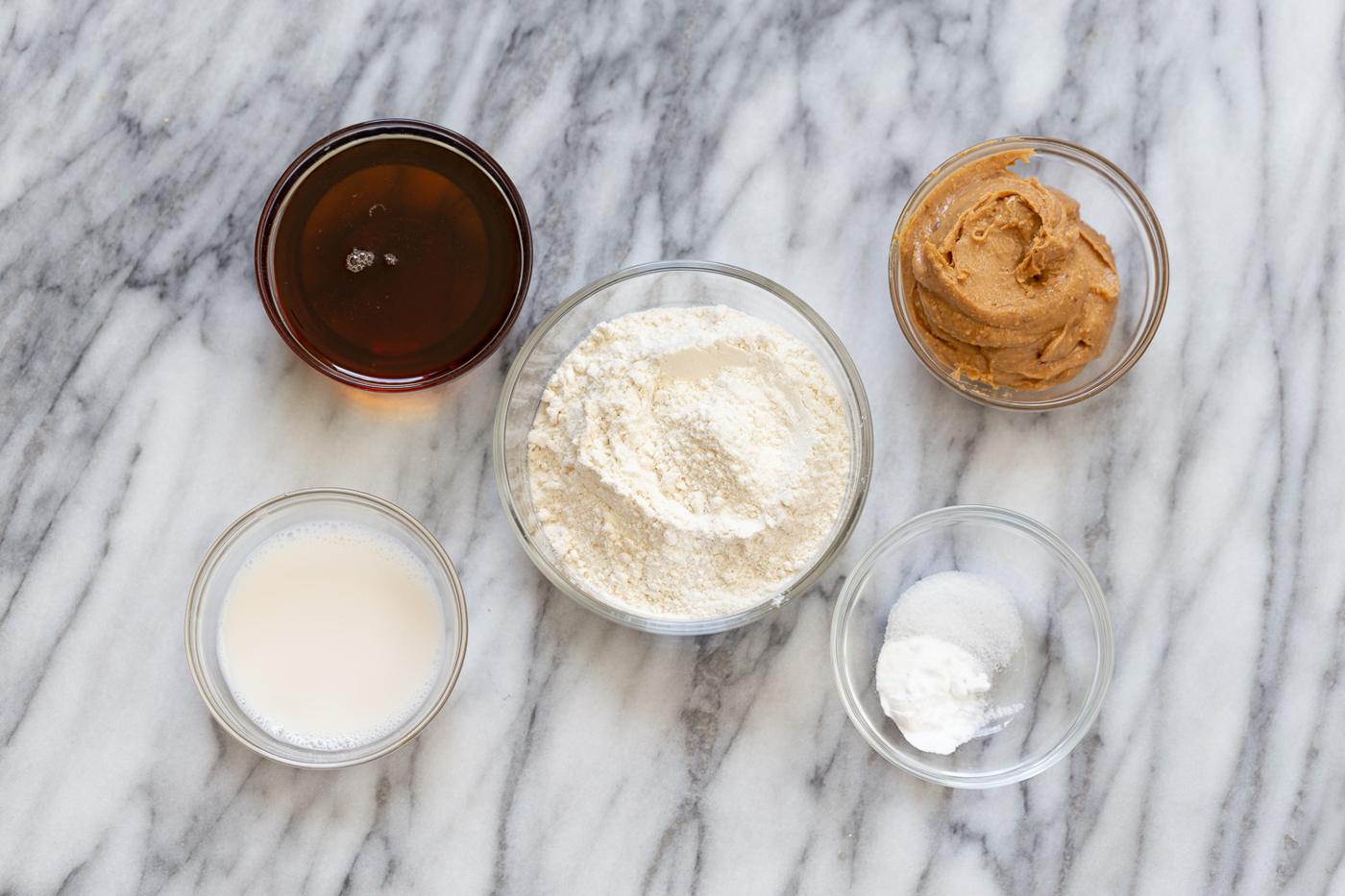 overhead shot of ingredients needed for making vegan snickers snack bars recipe