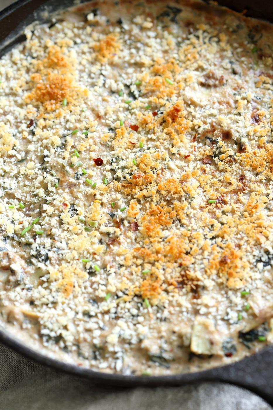 Vegan Spinach Artichoke Dip in a cast iron skillet