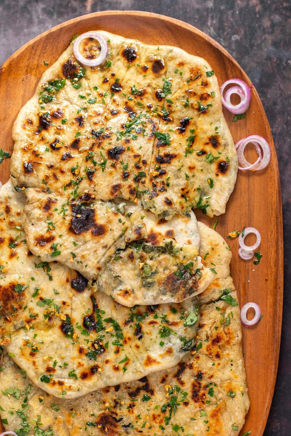vegan potato spinach cheese stuffed naan brushed with garlic butter
